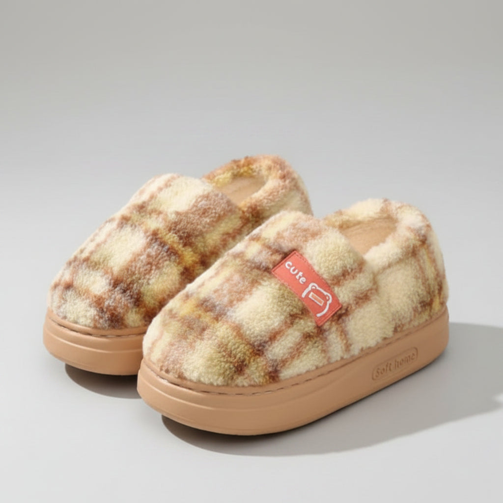 Plush slippers with a 'cute' label on a soft surface, featuring the brand 'EVA'.