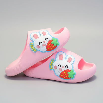 Pink children's clogs with cartoon bunny design on a gray background